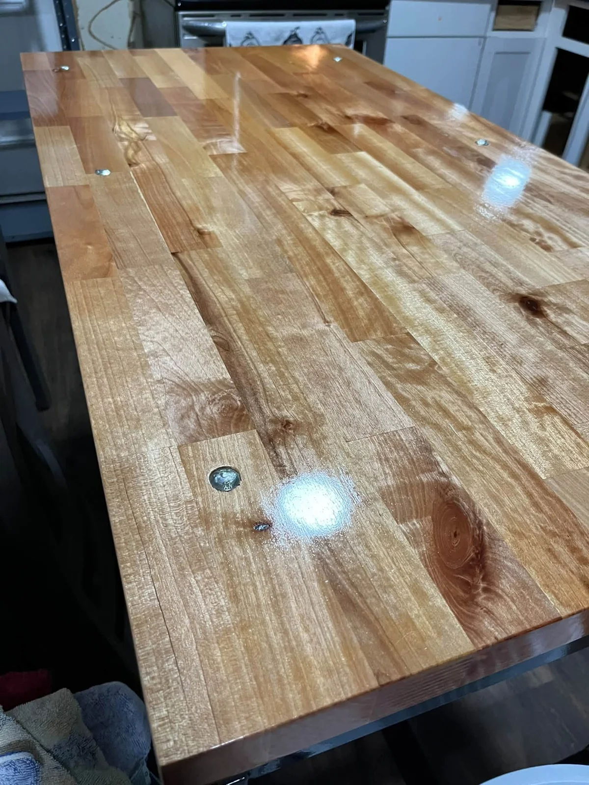 Finished natural wood tabletop from the supplied project photos